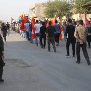 Assayish protecting the march in Derik